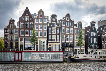 Naklejka premium dancing houses of Amsterdam, traditional houses