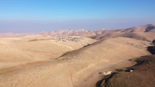 Bedouin camp Isolated in Judaean desert Aerial view
Drone footage over Bedouin outpost Close to Israeli City Maale Adumim Aerial, Israel
