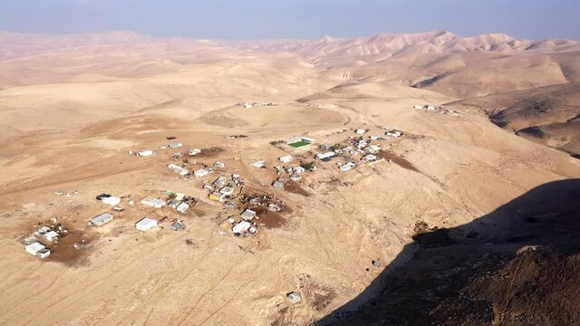 Bedouin camp Isolated in Judaean desert Aerial view
Drone footage over Bedouin outpost Close to Israeli City Maale Adumim Aerial, Israel
