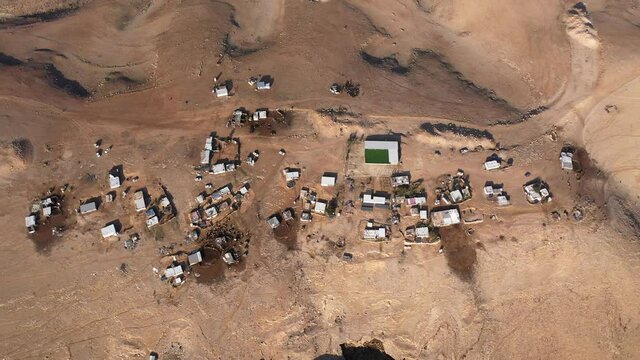 Bedouin camp Isolated in Judaean desert Aerial view
Drone footage over Bedouin outpost Close to Israeli City Maale Adumim Aerial, Israel
