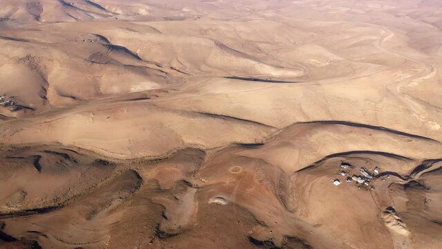 Bedouin camp Isolated in Judaean desert Aerial view
Drone footage over Bedouin outpost Close to Israeli City Maale Adumim Aerial, Israel
