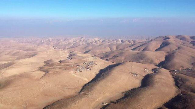 Bedouin camp Isolated in Judaean desert Aerial view
Drone footage over Bedouin outpost Close to Israeli City Maale Adumim Aerial, Israel
