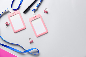 Blank badges and stationery on white background