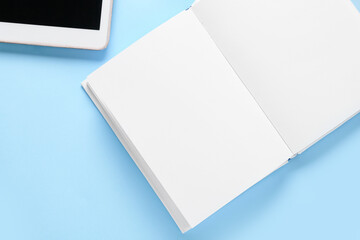 Blank book on color background