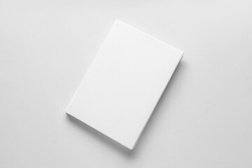 Blank book on light background