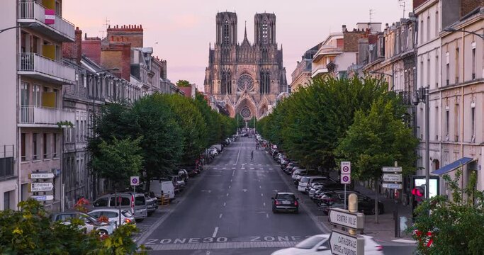 Summer time-laps, view on Reim's cathedral facade from Libergier street, summer Reims Champagne, France