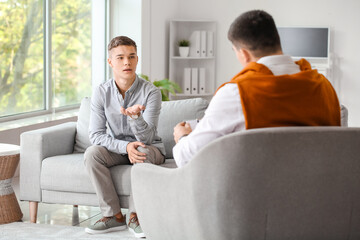 Teenage boy at psychologist's office