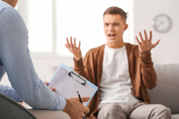 Teenage boy at psychologist's office