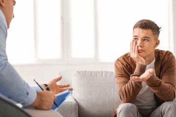 Teenage boy at psychologist's office