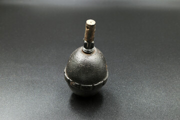 Fototapeta na wymiar vintage german hand grenade on black background