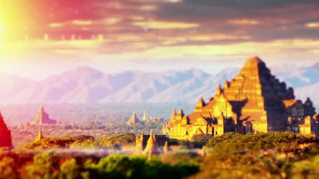 Aerial track left of the temples in the ancient city of Bagan, Myanmar. World heritage site. Bokeh effect.