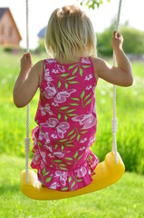 little child on swing
