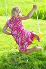 child on swing