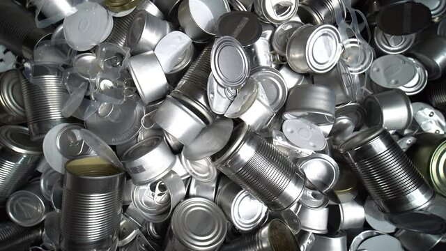 Recycle empty cans and tin for food and drink. Aluminum soda cans and food jars. Sorted metal trash and garbage ready for recycling. Steel rubbish. Zero waste and no pollution.