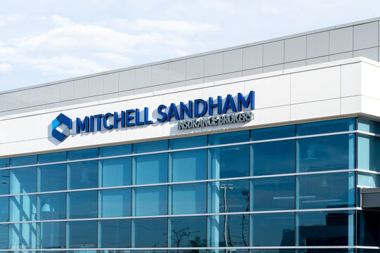 Oakville, Ontario, Canada - May 27, 2019: Sign of Mitchell Sandham office in Oakville, Ontario, Canada. Mitchell Sandham Insurance Broker is a 
insurance and financial services brokerage. 