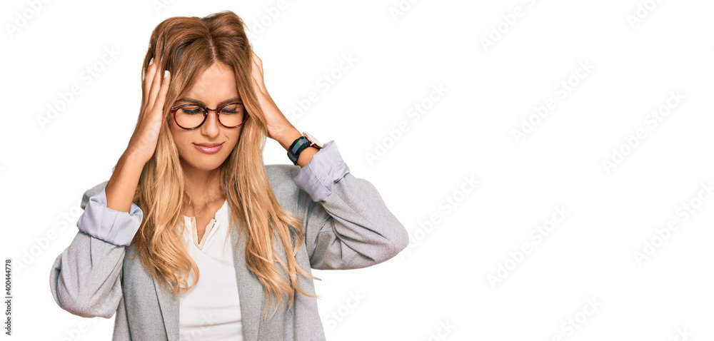 Sticker beautiful blonde young woman wearing business clothes with hand on head, headache because stress. su