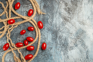 top view red cherry tomatoes with ropes on light background food ripe photo salad free place