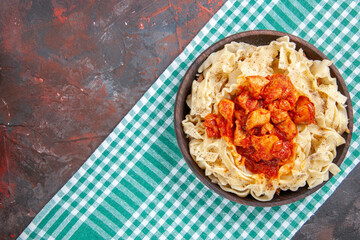 top view chicken with dough pasta dish on a dark background color meal pasta dish