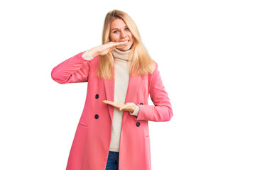 Young beautiful blonde woman wearing elegant clothes gesturing with hands showing big and large size sign, measure symbol. smiling looking at the camera. measuring concept.