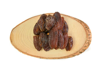 Natural dried dates (fruits of date palm Phoenix dactylifera) on wood. isolated on white background