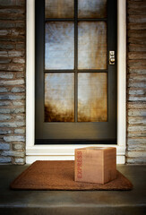 Online shopping express delivery box outside door. Copy space