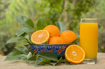 Orange and orange juice outdoor.