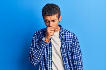Young african amercian man wearing casual clothes feeling unwell and coughing as symptom for cold or bronchitis. health care concept.