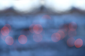 Blurred red lights on blue-gray background