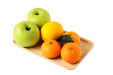 Fruit on a wooden tray. Apples, tangerines and lemon isolated on a white background.
