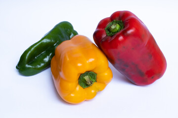 Three peppers on white background 