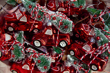 mountain of toy red toy cars with christmas tree