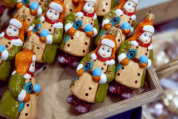 christmas tree toys boys in a fur coat hat close-u