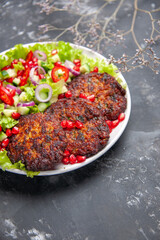 front view tasty meat cutlets with fresh salad on a grey background photo food dish meat
