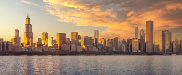 Fototapeta na wymiar Chicago downtown skyline sunset Lake Michigan with buildings , Illinois