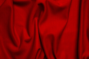 Obraz premium Red silk folded fabric background