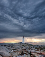 Peggy's Cove lighthouse with threatening storm clouds