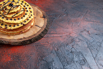 front view delicious sweet pancakes with icing on the dark background cake dessert milk