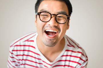 asian man portrait young male wear eye glasses smiling cheerful look thinking position with perfect clean skin posing on white background.fashion people life style concept