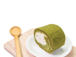 The close up of homemade matcha green tea cream roll soft cake dessert food with wood plank on white background.