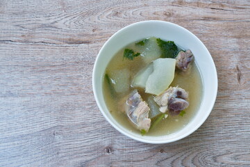 boiled winter melon with chicken soup on bowl