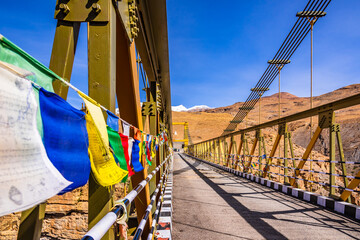 Chicham bridge is suspension stiffened steel truss bridge at altitude of 4145m over 1000 feet gorge...