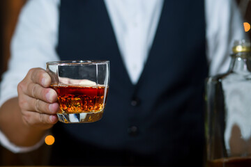 Bartender Serve Whiskey, on wood bar, 