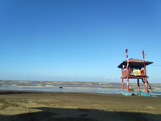 Lifeguard tower with beautiful sky at the beach