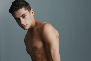 Fototapeta premium Sexy topless guy leaned back and bare shoulders