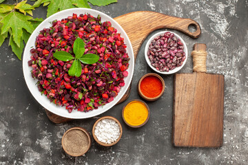 top view vinaigrette salad with beet and beans on the grey background food salad diet