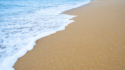 Close-up wave on sand beach , nature background