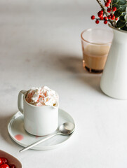 the cup of coffee with whipped cream