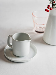 Fototapeta na wymiar the white mug on the table