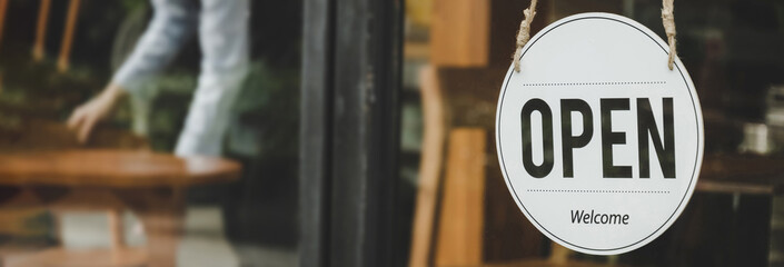 panoramic wide banner. coffee cafe shop text on vintage sign board hanging on glass door in cafe shop open after coronavirus quarantine in restaurant ready to service, small business owner concept