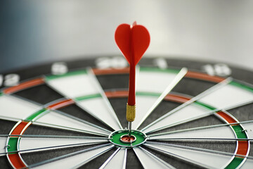 Darts. The dart for playing in the game board is stuck. Hit the sector in darts. The concept of a...